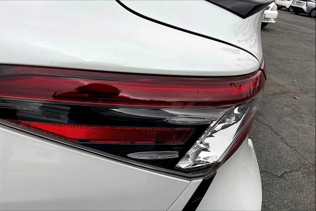 Photo of 2024 Wind Chill Pearl/Midnight Black Metallic Toyota Camry