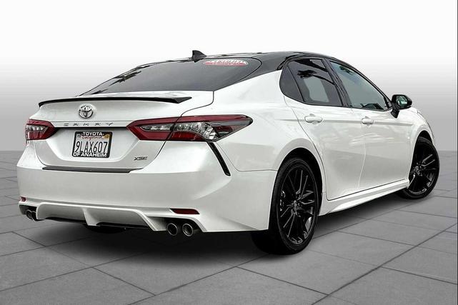 Photo of 2024 Wind Chill Pearl/Midnight Black Metallic Toyota Camry