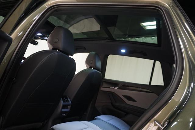 Photo of 2025 Avocado Green w/Deep Black Roof Volkswagen Tiguan