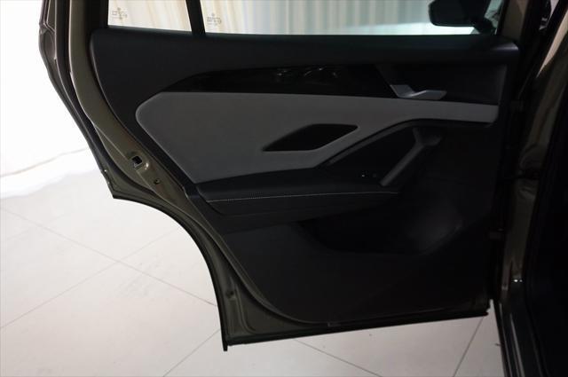 Photo of 2025 Avocado Green w/Deep Black Roof Volkswagen Tiguan