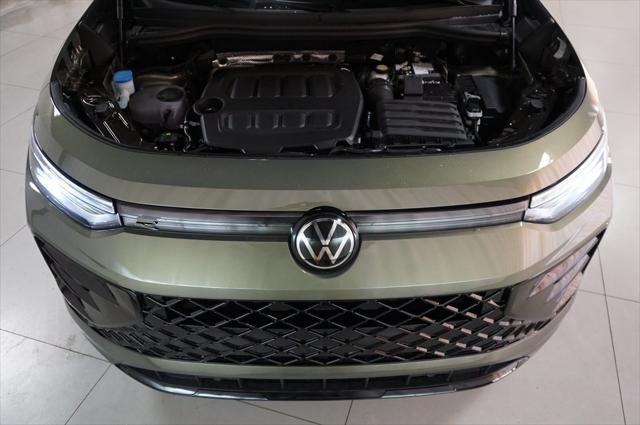 Photo of 2025 Avocado Green w/Deep Black Roof Volkswagen Tiguan