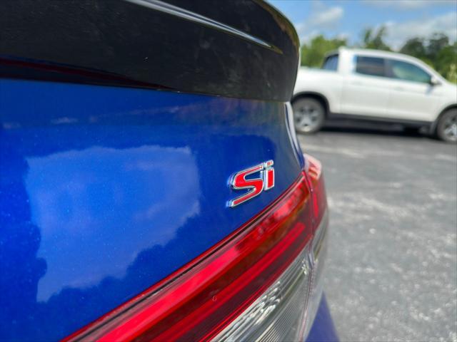 Photo of 2024 Aegean Blue Metallic Honda Civic Si