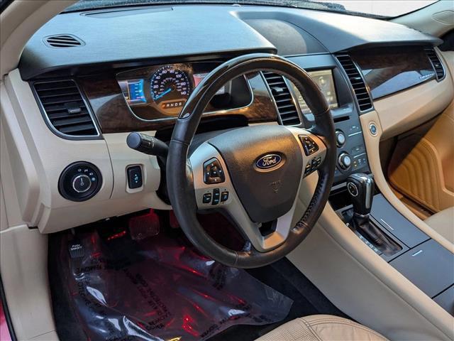 Photo of 2015 Ruby Red Metallic Tinted Clearcoat Ford Taurus