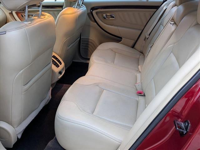 Photo of 2015 Ruby Red Metallic Tinted Clearcoat Ford Taurus