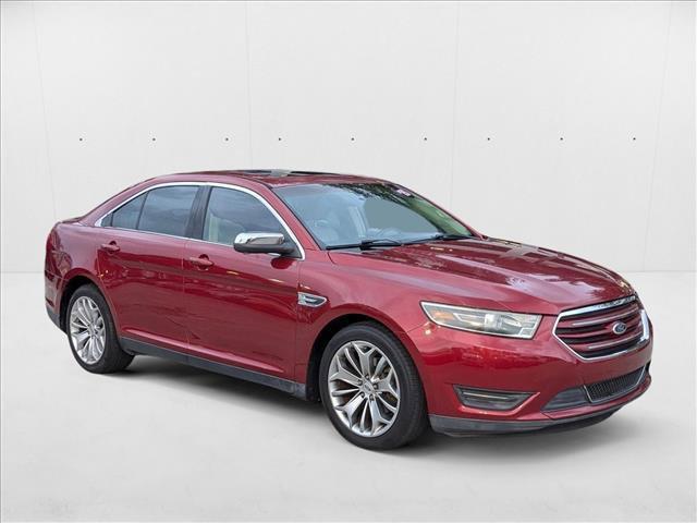 Photo of 2015 Ruby Red Metallic Tinted Clearcoat Ford Taurus
