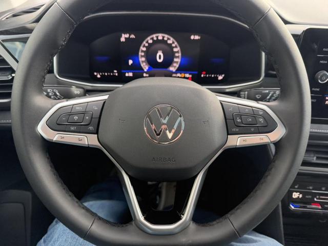 Photo of 2025 Pure White W/Black Roof Volkswagen Taos