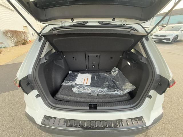 Photo of 2025 Pure White W/Black Roof Volkswagen Taos