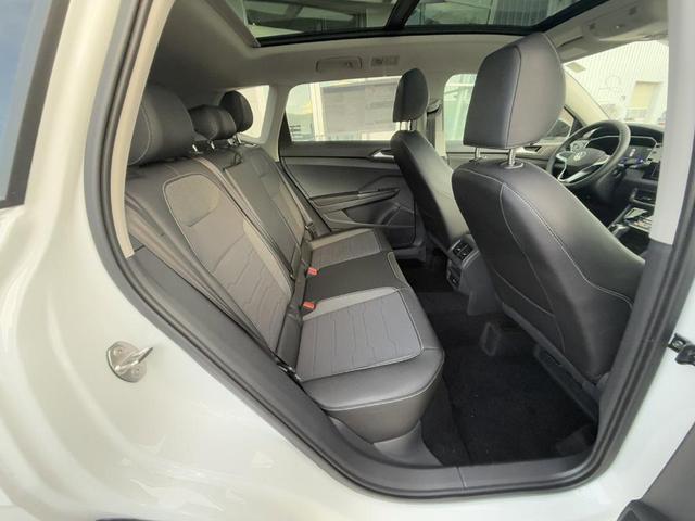 Photo of 2025 Pure White W/Black Roof Volkswagen Taos