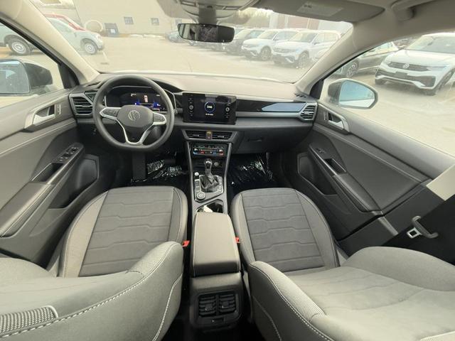 Photo of 2025 Pure White W/Black Roof Volkswagen Taos