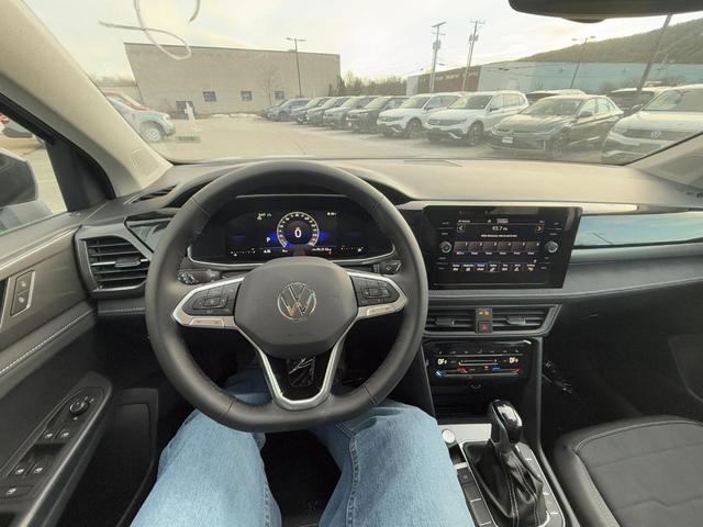 Photo of 2025 Pure White W/Black Roof Volkswagen Taos