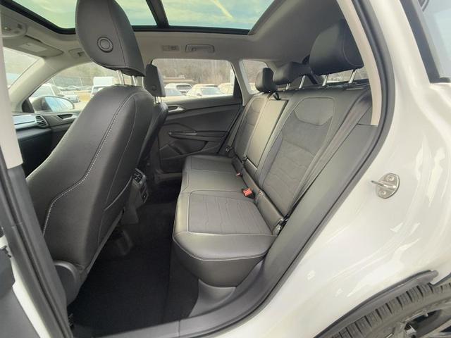 Photo of 2025 Pure White W/Black Roof Volkswagen Taos