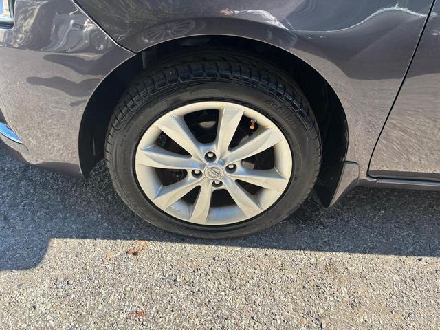 Photo of 2015 Brown Nissan Versa