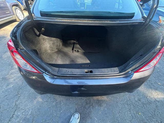 Photo of 2015 Brown Nissan Versa