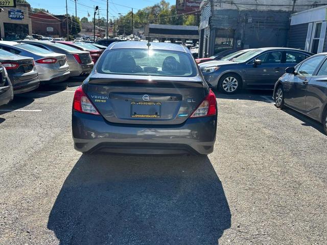 Photo of 2015 Brown Nissan Versa