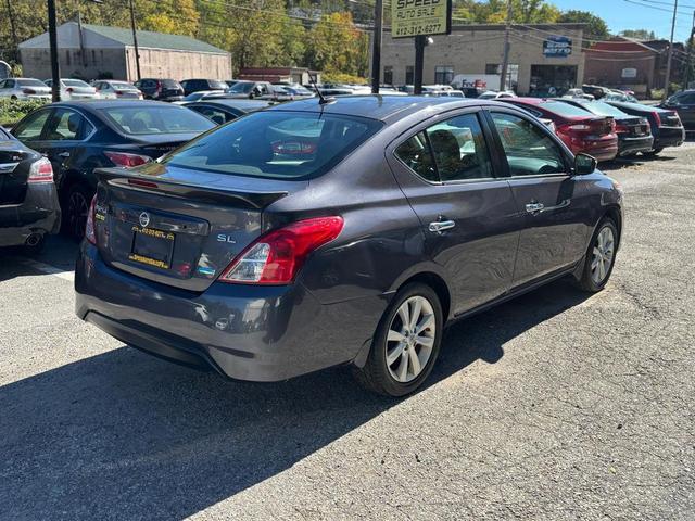 Photo of 2015 Brown Nissan Versa