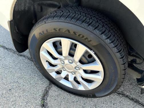 Photo of 2012 Pearl White Nissan Rogue