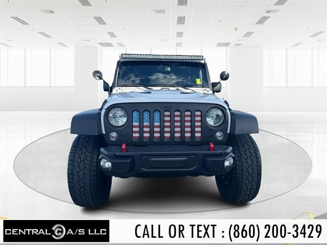 Photo of 2016 Bright White Clearcoat Jeep Wrangler Unlimited