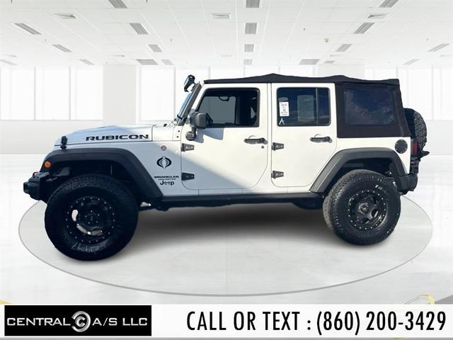 Photo of 2016 Bright White Clearcoat Jeep Wrangler Unlimited