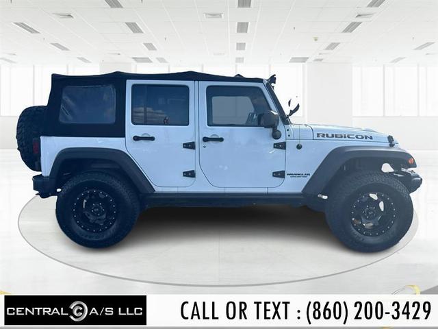 Photo of 2016 Bright White Clearcoat Jeep Wrangler Unlimited