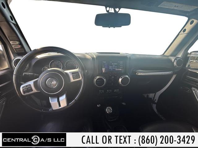 Photo of 2016 Bright White Clearcoat Jeep Wrangler Unlimited