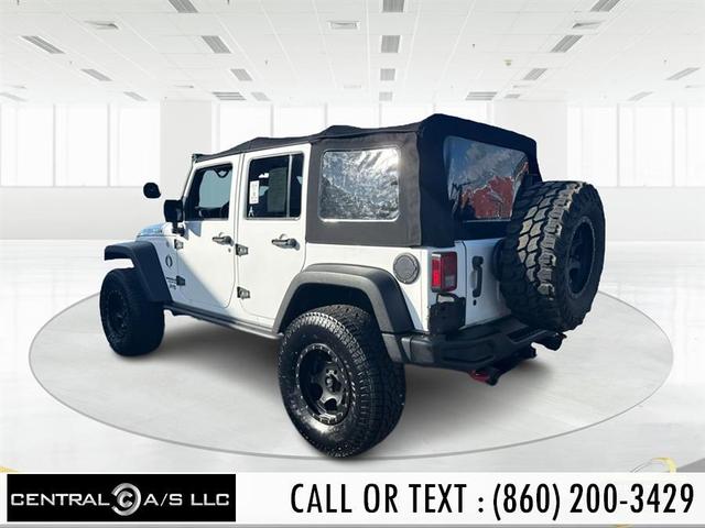 Photo of 2016 Bright White Clearcoat Jeep Wrangler Unlimited