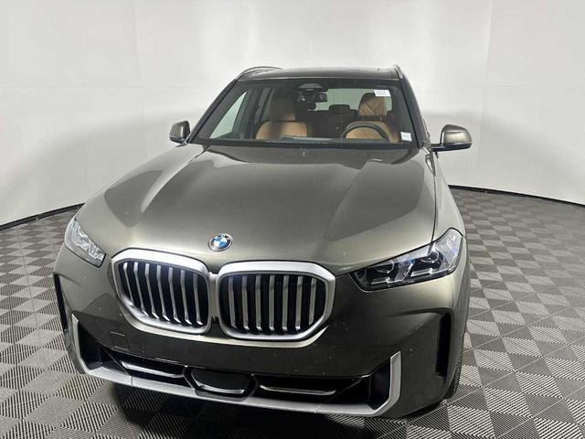 Photo of 2026 Manhattan Green Metallic BMW X5