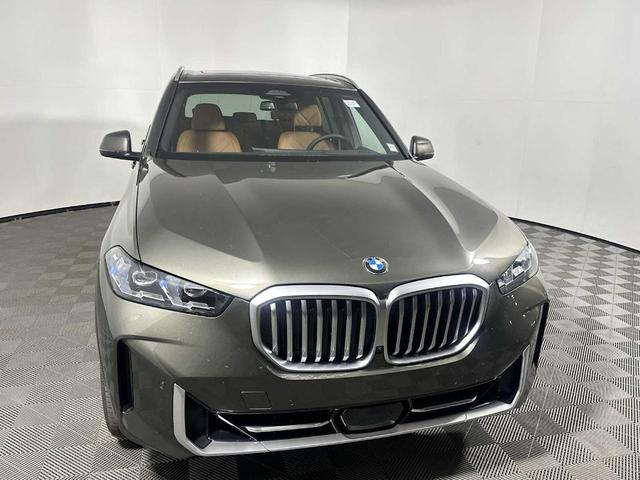 Photo of 2026 Manhattan Green Metallic BMW X5