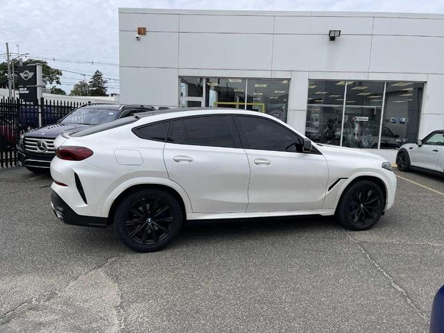 Photo of 2024 Carbon Black Metallic BMW X6