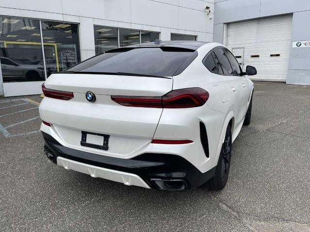 Photo of 2024 Carbon Black Metallic BMW X6
