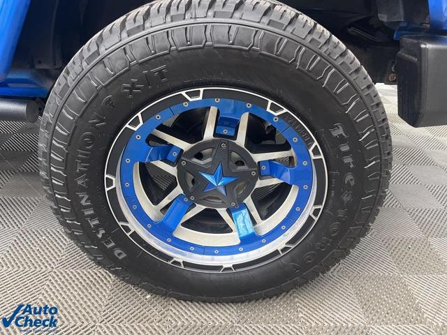 Photo of 2016 Hydro Blue Pearl Jeep Wrangler Unlimited