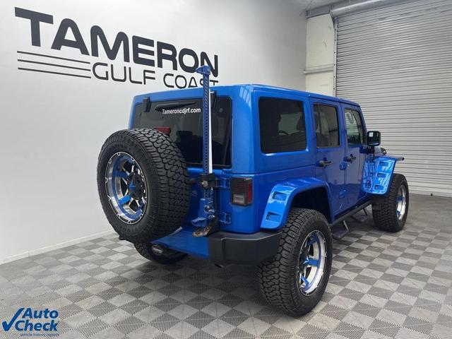 Photo of 2016 Hydro Blue Pearl Jeep Wrangler Unlimited