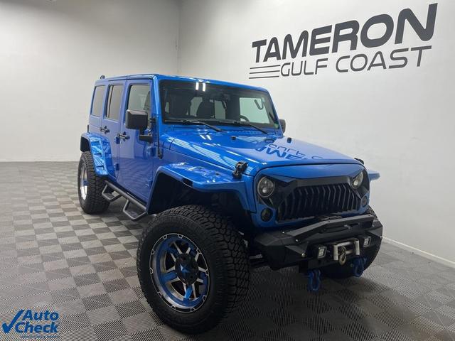 Photo of 2016 Hydro Blue Pearl Jeep Wrangler Unlimited