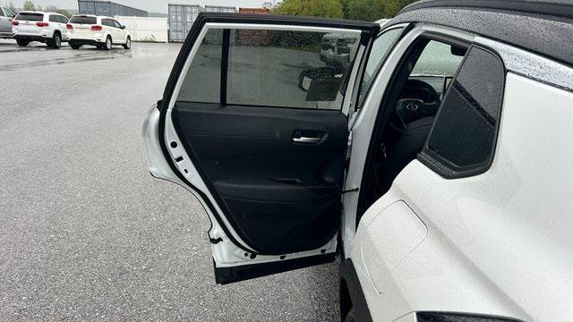 Photo of 2026 Wind Chill Pearl/Jet Black Toyota Corolla Hybrid