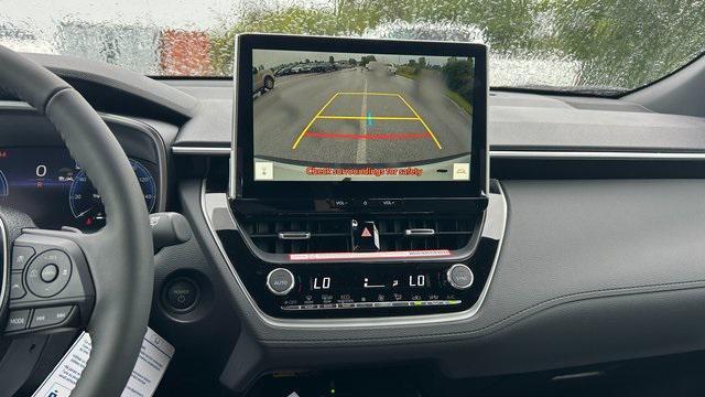 Photo of 2026 Wind Chill Pearl/Jet Black Toyota Corolla Hybrid