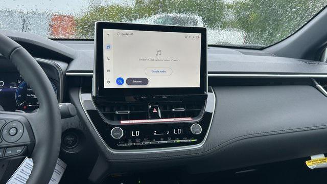 Photo of 2026 Wind Chill Pearl/Jet Black Toyota Corolla Hybrid