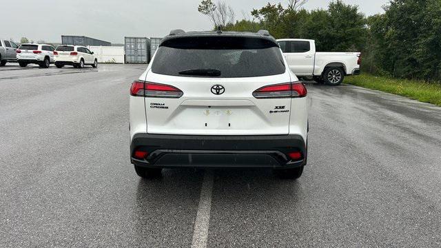 Photo of 2026 Wind Chill Pearl/Jet Black Toyota Corolla Hybrid