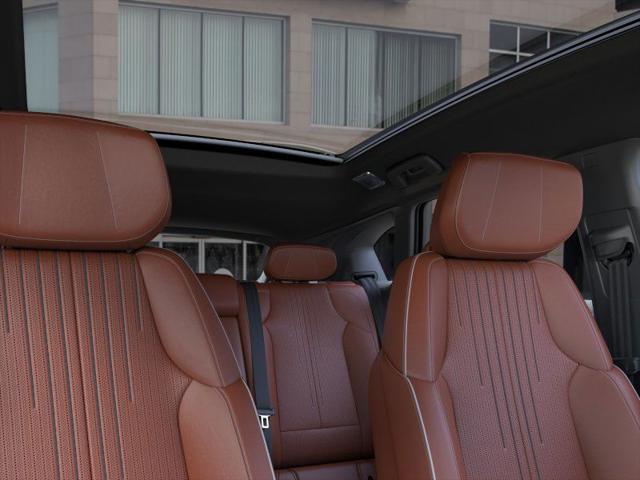 Photo of 2025 Crystal White Tricoat Cadillac OPTIQ
