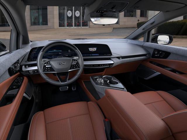 Photo of 2025 Crystal White Tricoat Cadillac OPTIQ