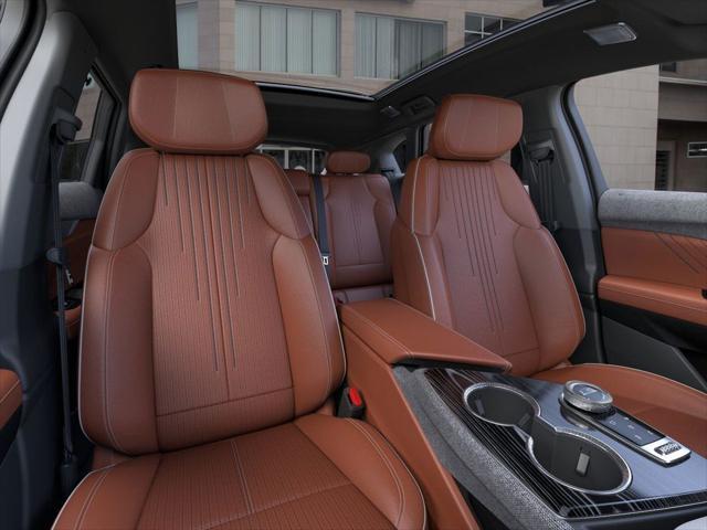 Photo of 2025 Crystal White Tricoat Cadillac OPTIQ