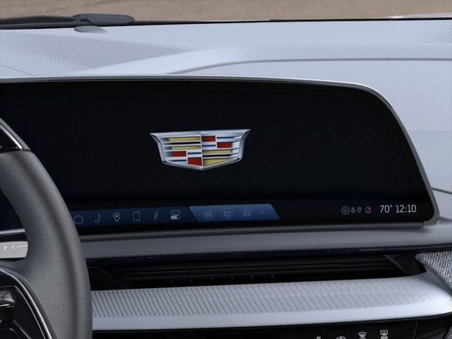 Photo of 2025 Crystal White Tricoat Cadillac OPTIQ