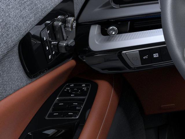 Photo of 2025 Crystal White Tricoat Cadillac OPTIQ
