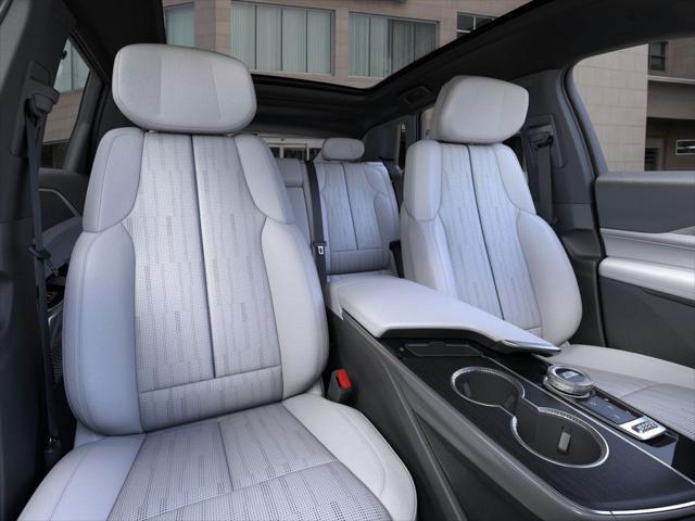 Photo of 2025 Emerald Lake Metallic Cadillac LYRIQ