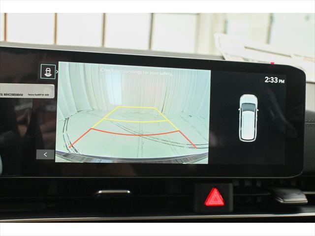 Photo of 2025 Aurora Black Pearl Kia Carnival Hybrid