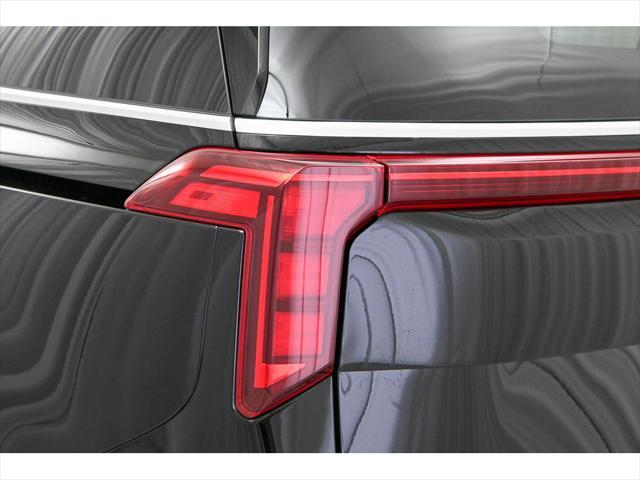 Photo of 2025 Aurora Black Pearl Kia Carnival Hybrid