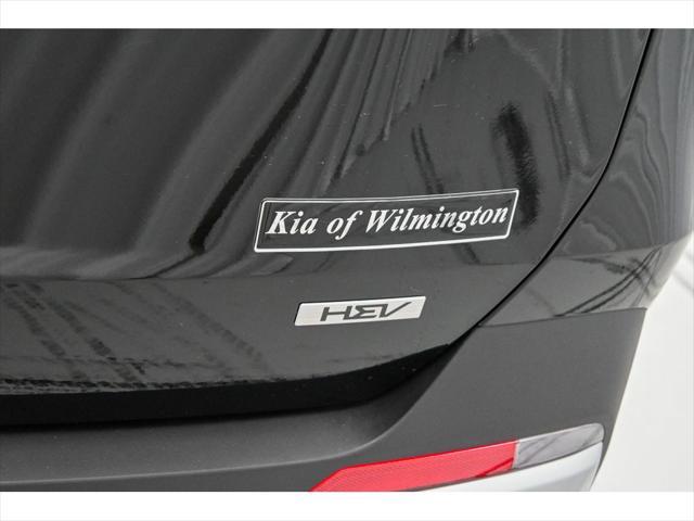 Photo of 2025 Aurora Black Pearl Kia Carnival Hybrid