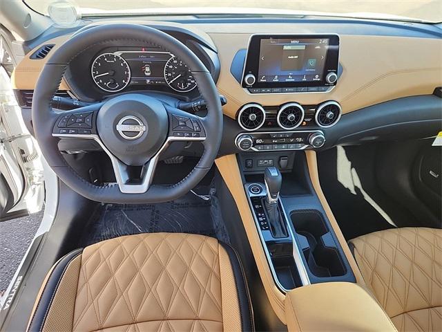 Photo of 2025 Aspen White Tricoat Nissan Sentra