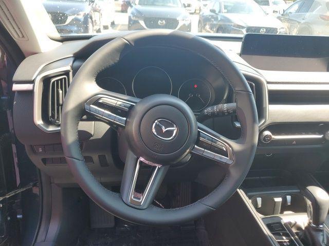 Photo of 2025 Ingot Blue Metallic Mazda CX-50