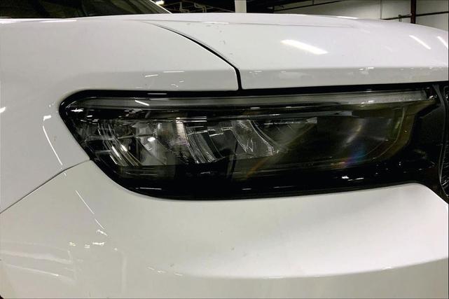 Photo of 2025 Bright White Clearcoat Jeep Grand Cherokee