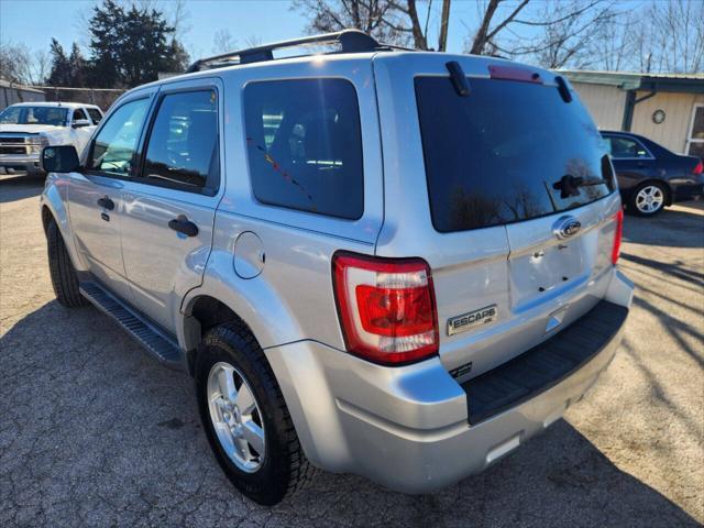 Photo of 2011 Ingot Silver Metallic Ford Escape