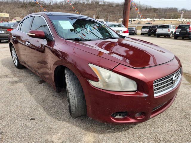 Photo of 2010 Burgundy Nissan Maxima